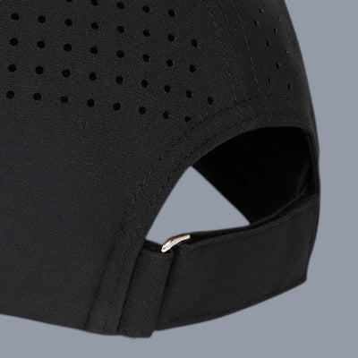 Three-quarter close-up back view of a black 5-panel cap against a plain gray background