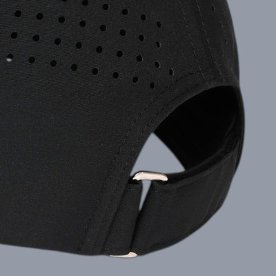 Three-quarter close-up back view of a black baseball cap against a plain gray background